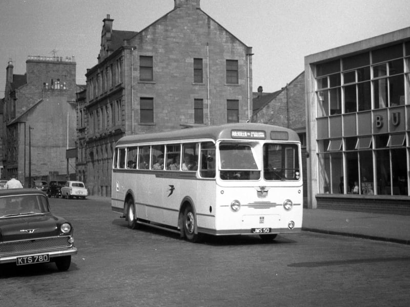 The Seagate bus station was opened in 1958 to replace Alexander’s bus station on Lindsay Street/South Ward Road. The site was originally the Trades Lane Calendar Works. The bus seen here is No AC99 (JMS 50), an Alexander-bodied AEC Reliance new in July 1956; it is heading for Aberdeen via Brechin.