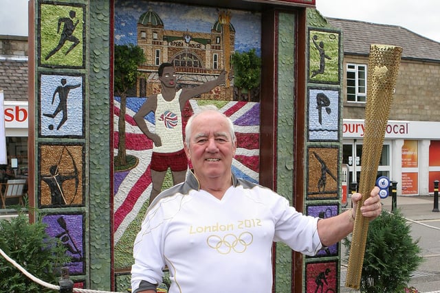 Buxton Wells Dressings, torch bearer Bill Weston and the Olympic themed Market Place Well