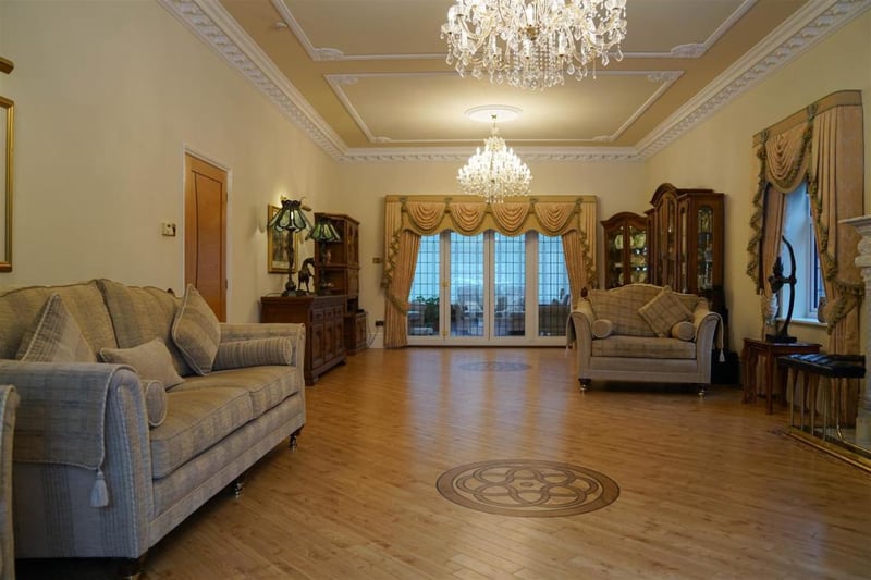 Attractive motifs within the wooden floor are distinguishing features.