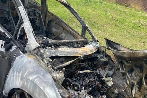 One of the cars destroyed by the fires.