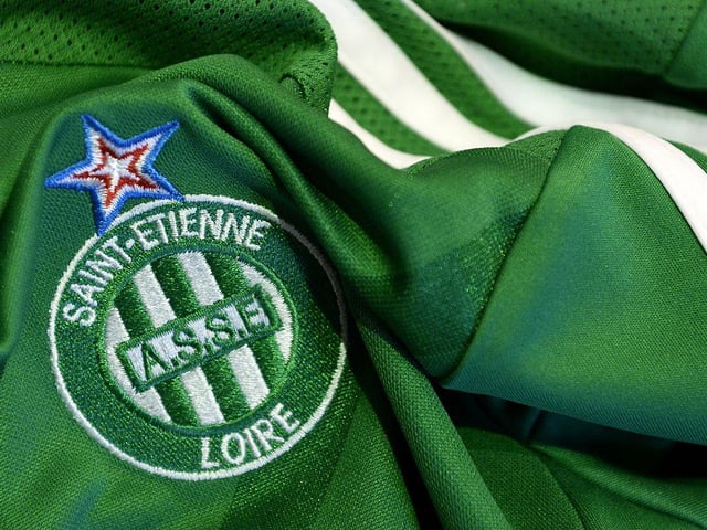 What unusual gift from French club St Etienne is kept in the trophy room at Ibrox?