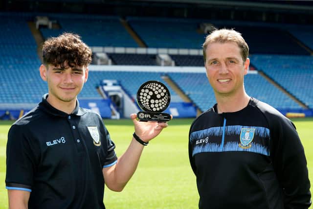 Will Trueman of Sheffield Wednesday wins EFL Apprentice of the Year Award 2021 - pictured with Owls Academy Manager Steven Haslam. (Pic Steve Ellis)