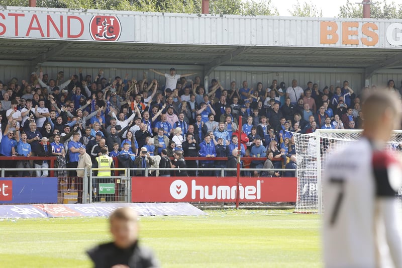 Portsmouth fans in the away end at Highbury Stadium, Fleetwood on opening day of the season. Picture: Paul Thompson