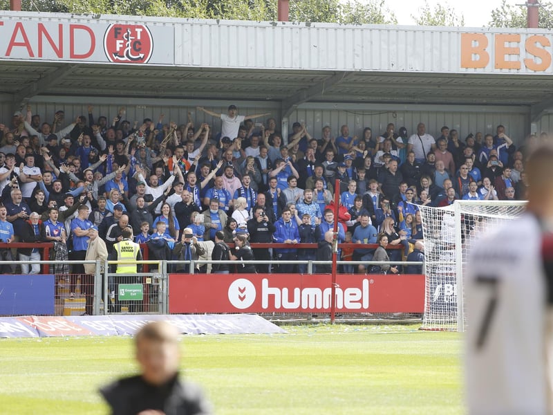 Portsmouth fans in the away end at Highbury Stadium, Fleetwood on opening day of the season. Picture: Paul Thompson
