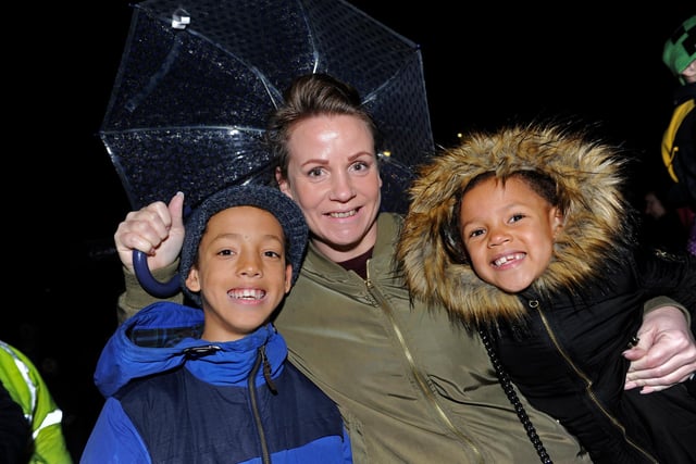 Hundreds of people saw the Christmas lights switch on at Commercial Road, Portsmouth in 2016. (left to right),  Lemar Adekoya (11), mum Angela Welch and sister Shadae (six).
Picture Ian Hargreaves (161295-3)