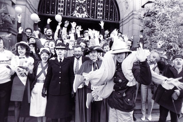 Fireman Mike Hurst gives a lift to Coral Smith of Oxfam outside the Town Hall, Sheffield, for Comic Relief 1988


7th January 1988

