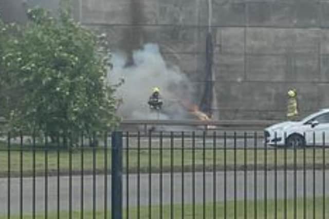 Firefighters were called to deal with a blaze next to Sheffield Parkway earlier today. Picture: Stacey Cox