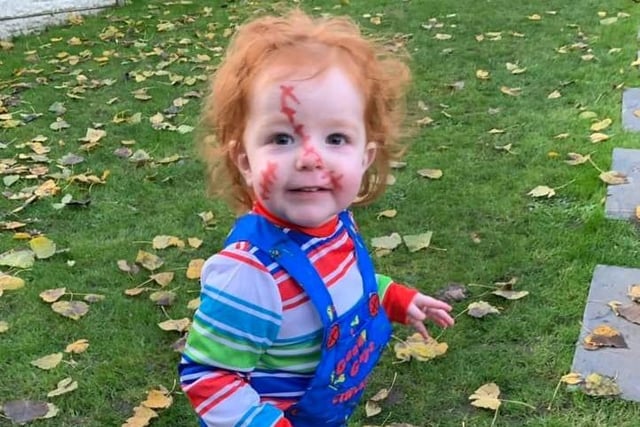 An adorable Baby Chucky costumed shared by Kerri Nash.