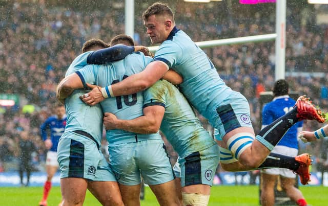Scotland’s Stuart McInally celebrates his try.