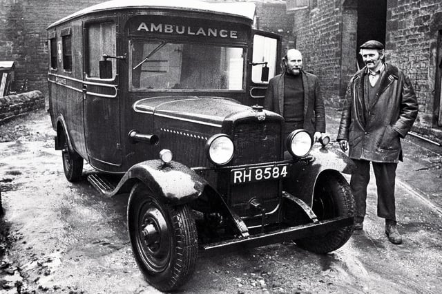 Mr Gordon Hemingway (right) with his brother, Vincent, of Whiteley Lane, Grenoside, examining their 1933 Bedford ambulance which was used in the television series "Sam".  The vehicle, a former steelworks ambulance, was extensively overhauled during the eight years the brothers owned it, November 1974