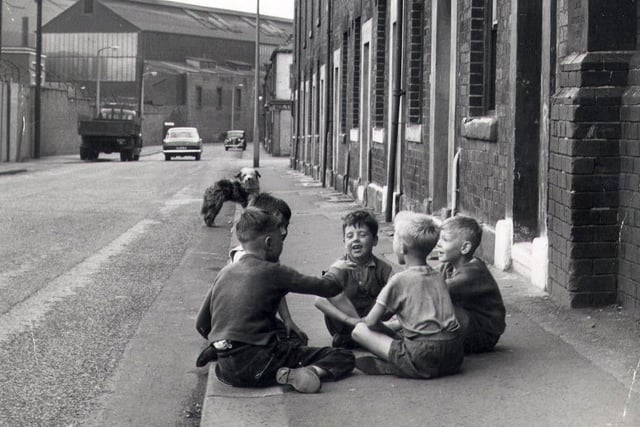 Boys at play in Carbrook Street in the East end before demolition in the 1960's
