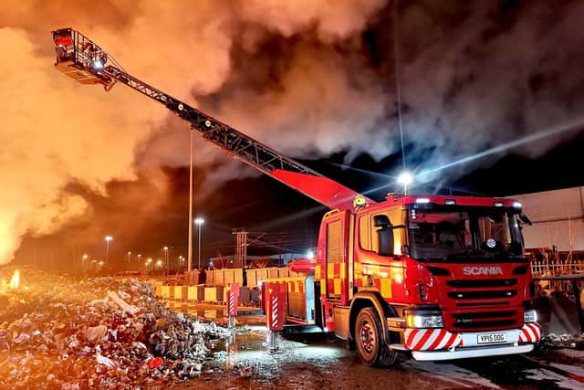 Firefighters are still tackling a huge fire at a recycling site on Balby Carr Bank in Doncaster, South Yorkshire