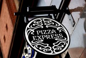 Pizza Express restaurant sign. Pizza Express has announced plans to close 73 of its restaurants across the UK.