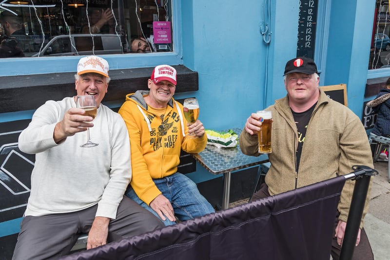Visitors to The Royal Albert on the first weekend after lockdown restrictions are eased. Pictured: Colin Day (56), Steven Quantrill (57) and Howard Turpie (52). Picture: Mike Cooter (220521)