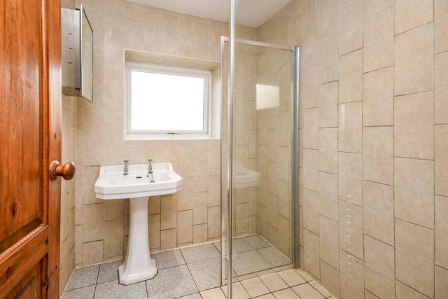 The ground floor also has its own modern and fully tiled shower-room. As well as the walk-in shower, with glass screen, there is a wash hand basin.