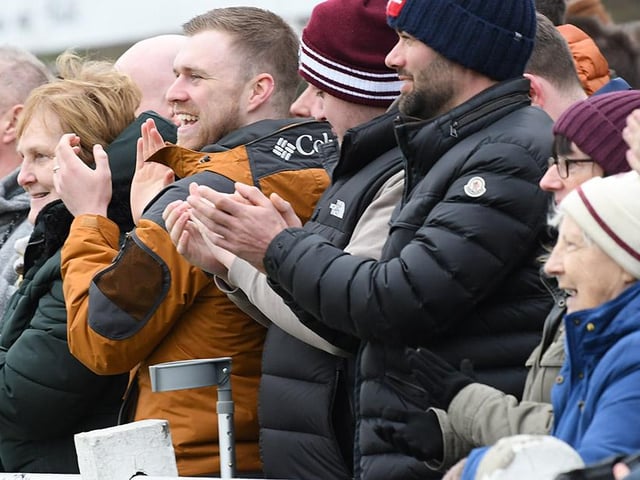 Fans celebrate as South Shields score again.