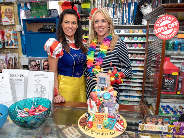 U-Need-Us 95th Anniversary - Sarah Jobe and Clare Searle with the 95th Anniversary cake