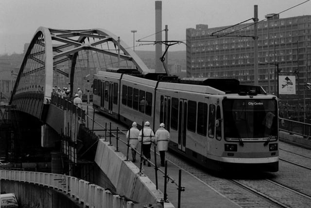 Sheffield Supertram on its first trial run from Nunnery Depot in 1993 as it reaches Commercial Street