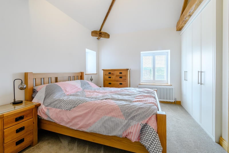 One of three bright, airy and luxurious bedrooms in the main home at Warren Farm. Planning permission has been acquired for two other homes on site.