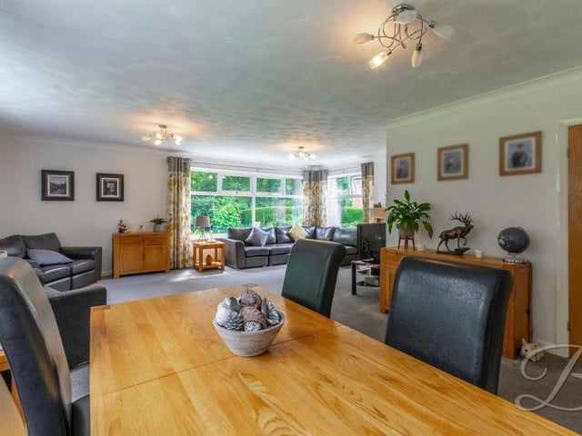 Like all rooms in the house, the dining room is bright and spacious. There is ample space for table and chairs.