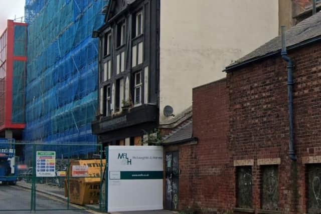 A Google Maps image from October 2021, showing construction work taking place around the old Yorkshireman's Arms pub in Burgess Street, Sheffield city centre - the pub is now subject to an emergency demolition order