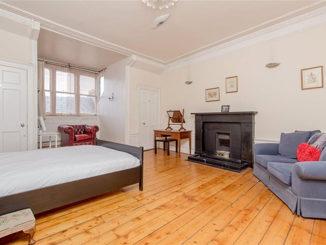 One of the four bedrooms.