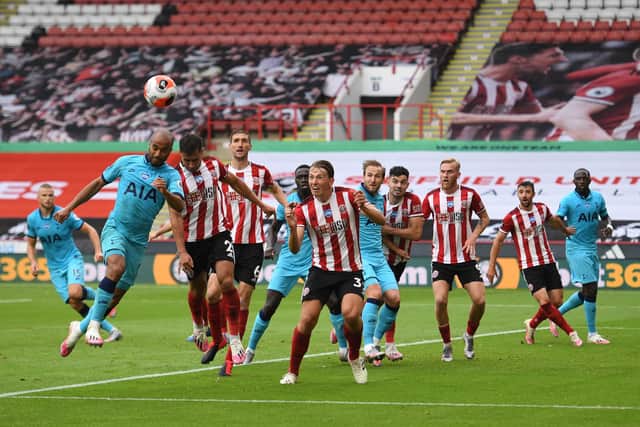 Sheffield United's defenders, including Chris Basham (fourth from left), go to work against Spurs last season: OLI SCARFF/POOL/AFP via Getty Images