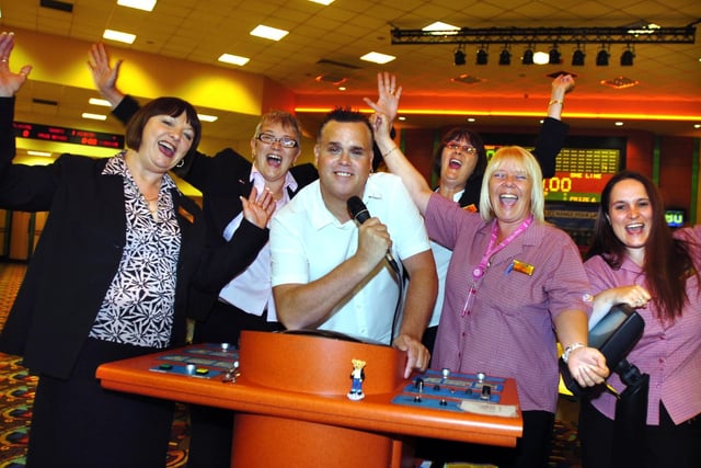Pictured is Jamie Butler, bingo caller at Mecca Bingo, on Penistone Road, Sheffield, with some of the other staff there.