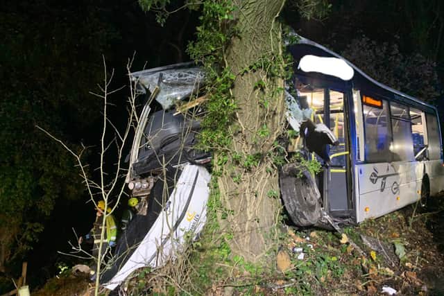 The bus driver escaped with minor injuries, police said.