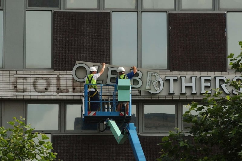 The Cole Brothers sign is removed as the store's name changes to John Lewis in 2002. The shop had long been a branch of the partnership but the firm wanted to give its outlets a more unified image.