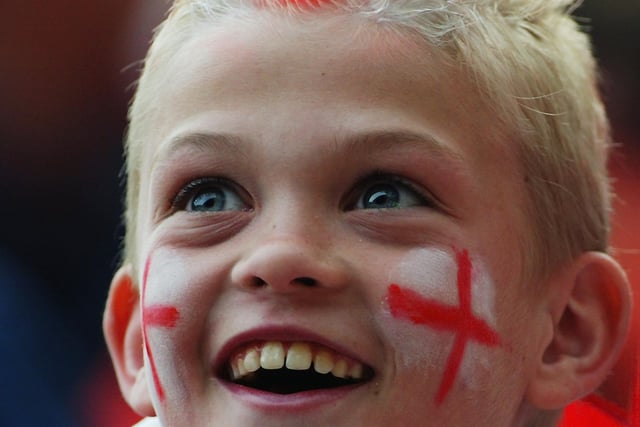 A young United fan pictured during the FA Cup semi-final against Arsenal at Old Trafford in April 2003.