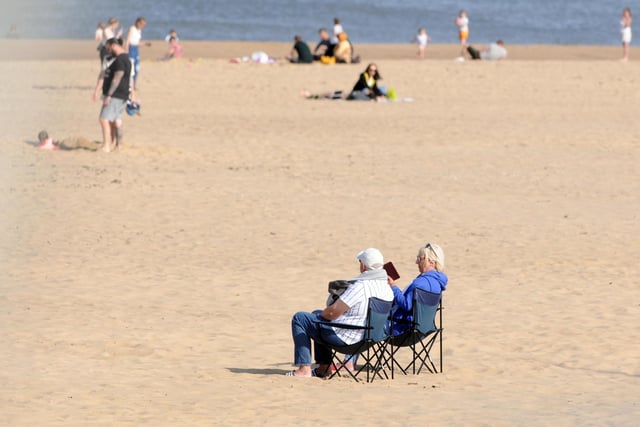 Members of the public kept their distance while enjoying a day at the beach.