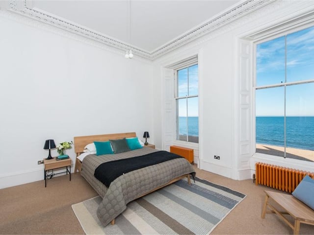 One of the two double bedrooms, which also has lovely sea views.