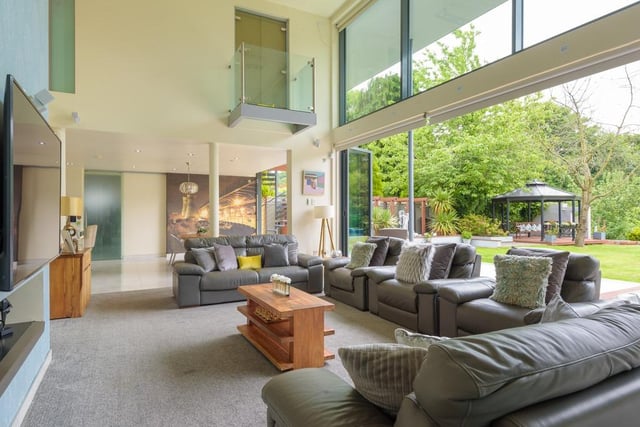 The ground floor of the property is almost entirely open-plan, with easy access from the lounge, through to the kitchen and dining area, with doors to the back garden stretching across the entire rear of the house.