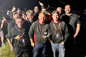 The Dynamite Fireworks team from Hucknall celebrate winning the national title again at Newby Hall