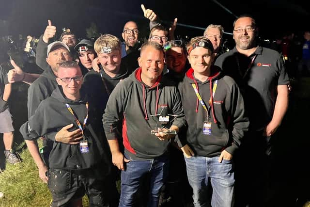 The Dynamite Fireworks team from Hucknall celebrate winning the national title again at Newby Hall