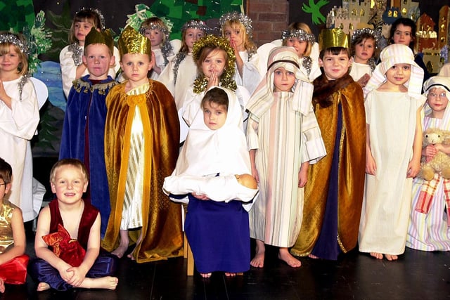 Pupils are performed The Nativity and The Magic Christmas Key. Our picture shows some of the Nativity play cast in 2003