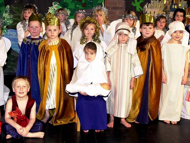 Pupils are performed The Nativity and The Magic Christmas Key. Our picture shows some of the Nativity play cast in 2003