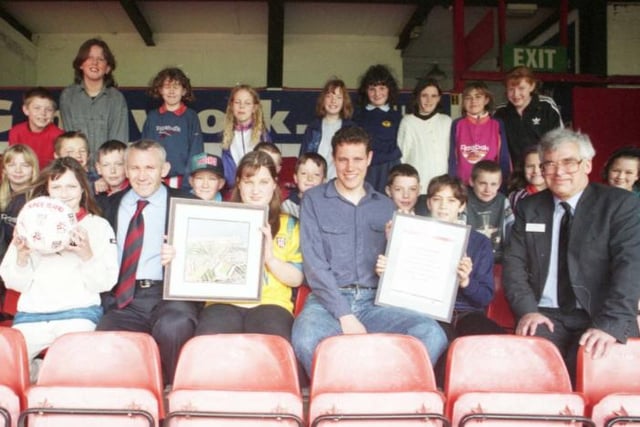 Back to 1995 and SAFC star Brett Angell is pictured with children from New Silksworth School at Roker Park, where they were taking part in the Learning Through Football scheme. Were you a part of it?