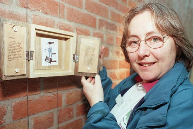 Caroline Taylor at the Doncaster Point with art work created by a patient at St John's Hospice, 2000.