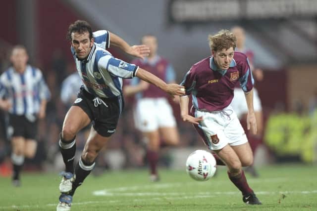 13 Dec 1997:  Paolo Di Canio (left) of Sheffield Wednesday gives chase during the FA Carling Premiership match against West Ham United at Upton Park. Ben Radford /Allsport