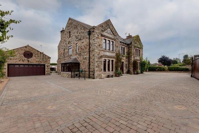 This five bedroom house has an orangery and indoor swimming pool.