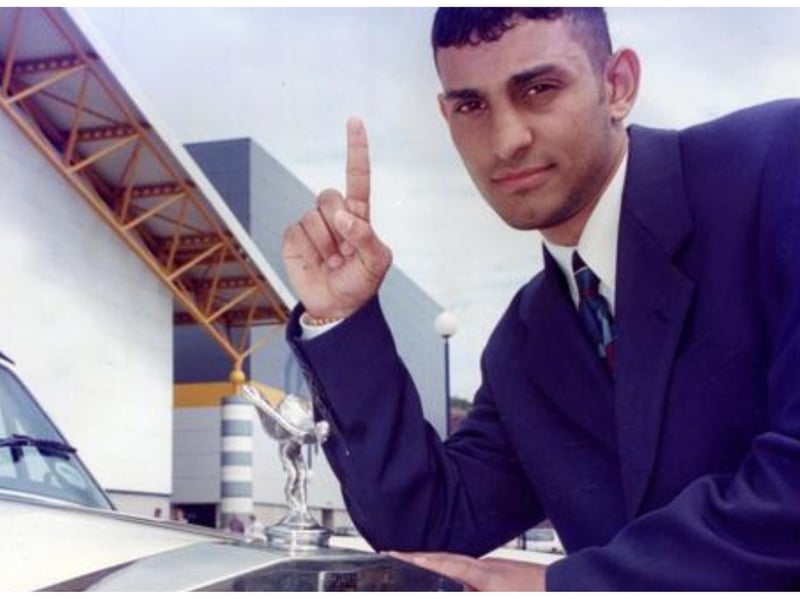 Pictured outside with a Rolls Royce outside Hillsborough leisure centre in 1994