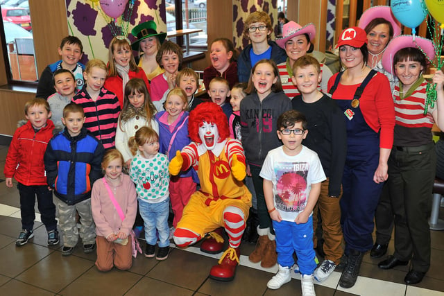 Ronald McDonald in the Marina restaurant with staff and customers. Remember this from seven years ago?