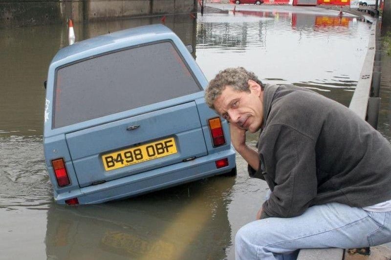 An unhappy day for this motorist who got stuck at Horns Bridge.