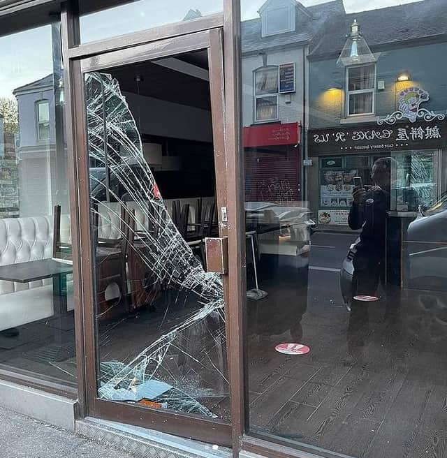 The door to La Crème on London Road, Sheffield, was smashed in overnight