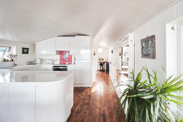 The kitchen is part of the open-plan top deck