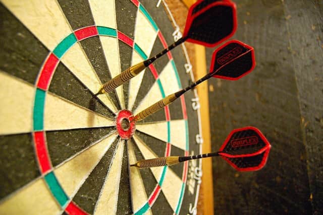 Doors 2 Floors Sales Manager Junaid Momoniat is looking to challenge customers to games of Darts.