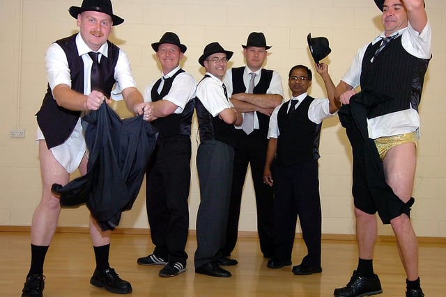 Fundraising Doncaster dads, from left, Lee Maidens, Steve Lamph, Phil Chapman, Lee Hardy, Murugesu Sivanbu and Aidan Gray do the Full Monty. Money raised in May 2009 helped fund a planned trip by pupils at Dickinson School of Dance to perform at Disneyland.