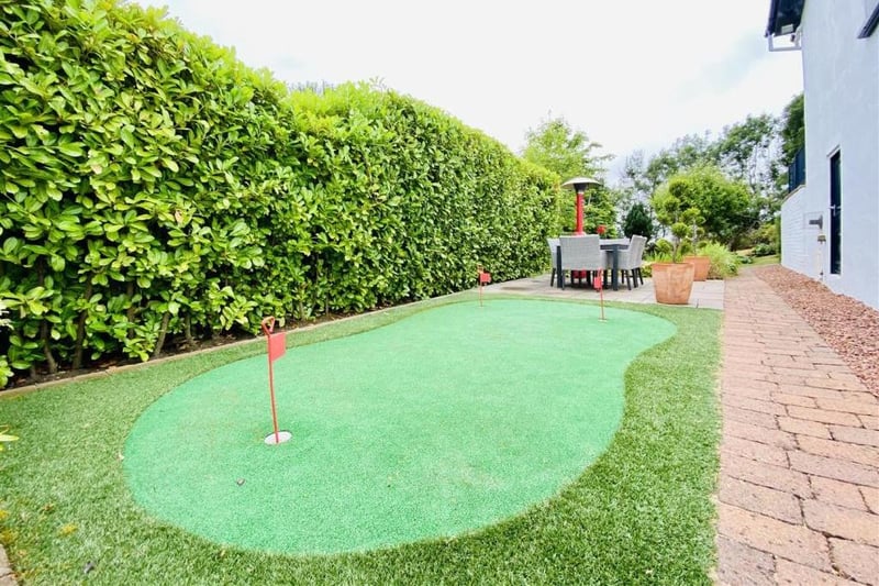 Golf fans are well-catered for in this unique garden which has its own small putting green!